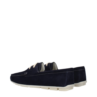 Flat Loafer Slip-On Shoes by Prada for women in suede leather blue showcases a resplendent Women's Suede Leather Flat Loafer Slip-On Shoes aesthetic, defined by its resplendent and elegant flat.