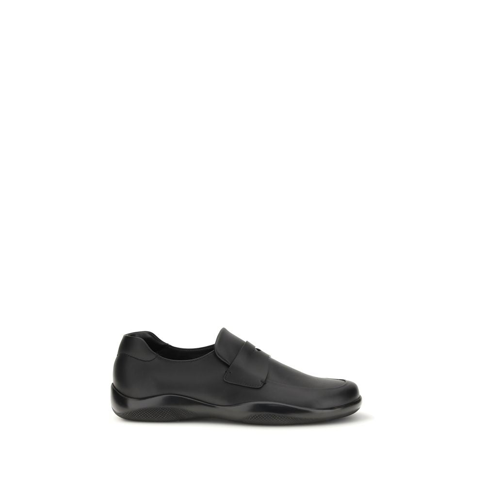 Moccasin Moccasins Loafer Slip-On Shoes by Prada for men in bos taurus calf leather black showcases a resplendent Men's Bos Taurus Calf Leather Moccasin Moccasins Loafer Slip-On Shoes aesthetic, defined by its resplendent and elegant .