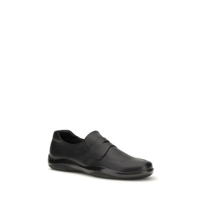 Moccasin Moccasins Loafer Slip-On Shoes by Prada for men in bos taurus calf leather black showcases a timeless silhouette from the Men's Bos Taurus Calf Leather Moccasin Moccasins Loafer Slip-On Shoes collection, featuring a timeless and for a timeless finish.