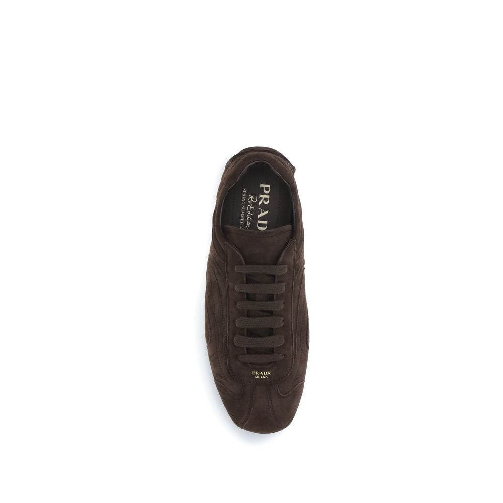 Athletic Sneakers by Prada for men in bos taurus calf suede leather brown & patterned showcases an impeccable silhouette, defined by an impeccable athletic style design that perfectly captures the essence of the Men's Athletic Bos Taurus Calf Suede Leather Sneakers.