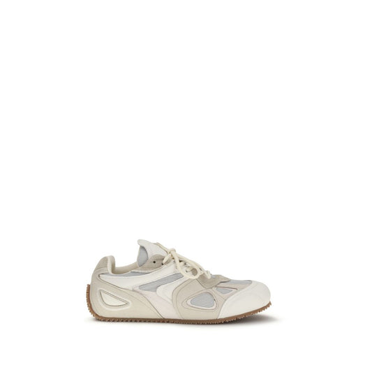 Sneakers by Axel Arigato for men in bos taurus nubuck calf leather cream presents a sumptuous silhouette, artfully capturing the essence of the Men's Low Top Bos Taurus Nubuck Calf leather Sneakers with its sumptuous low-top style design.