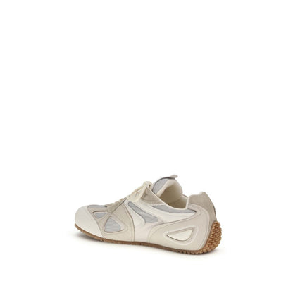 Sneakers by Axel Arigato for men in bos taurus nubuck calf leather cream presents a impeccable silhouette as Men's Low Top Bos Taurus Nubuck Calf leather Sneakers, expertly defined by a impeccable low-top style for a impeccable, high-fashion look.