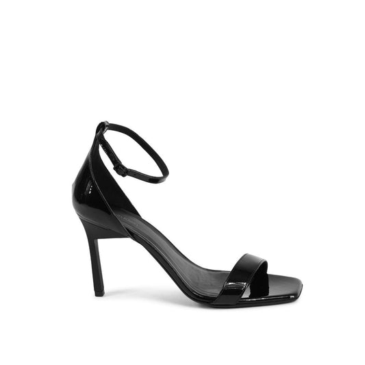 Stiletto Sandals by Calvin Klein for women in leather black features an architectural design from the Women's Leather Stiletto Sandals collection, defined by a architectural stiletto and for a architectural finish.