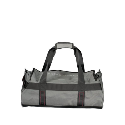 Small Flap Handbag by North Sails for unisex in cordura & coated canvas gray & print features an refined silhouette, showcasing a secure flap & zipper, ample external-pockets & internal-pockets, and versatile shoulder-strap, handle & adjustable-strap for a sophisticated refined aesthetic.