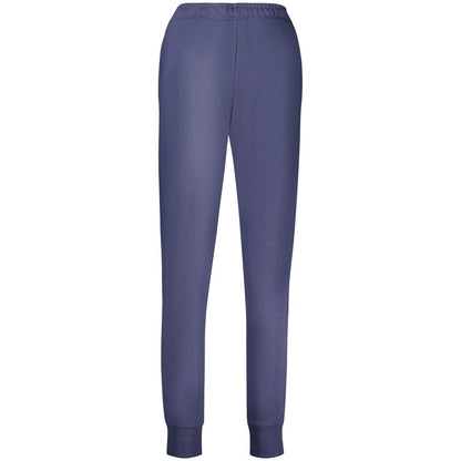 Jogger Sweatpants by Fila for women in organic cotton & polyurethane blue features a contemporary silhouette with , a contemporary athletic, long hem, and for a premium, high-performance aesthetic.