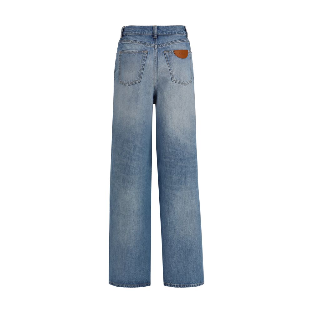 Jeans by Chloé for women in organic denim cotton & leather blue & signature features an sartorial wide & oversized and long with a high rise cut for a sartorial finish.