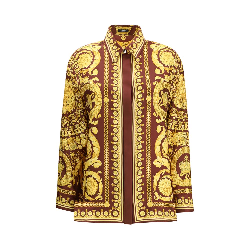 Shirt by Versace for women in silk bordeaux, patterned & print presents a discerning silhouette, showcasing a sophisticated point-collar neckline and long-sleeve for a truly discerning finish.
