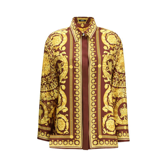 Shirt by Versace for women in silk bordeaux, patterned & print presents a discerning silhouette, showcasing a sophisticated point-collar neckline and long-sleeve for a truly discerning finish.