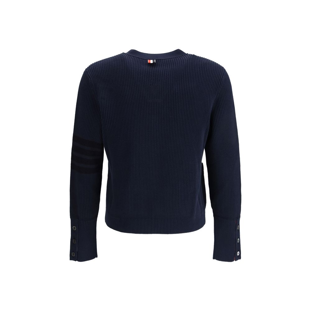 Cardigan by Thom Browne for men in cotton blue, signature & striped presents a textural silhouette, artfully finished with a textural v-neck neckline and for a sophisticated, textural look.