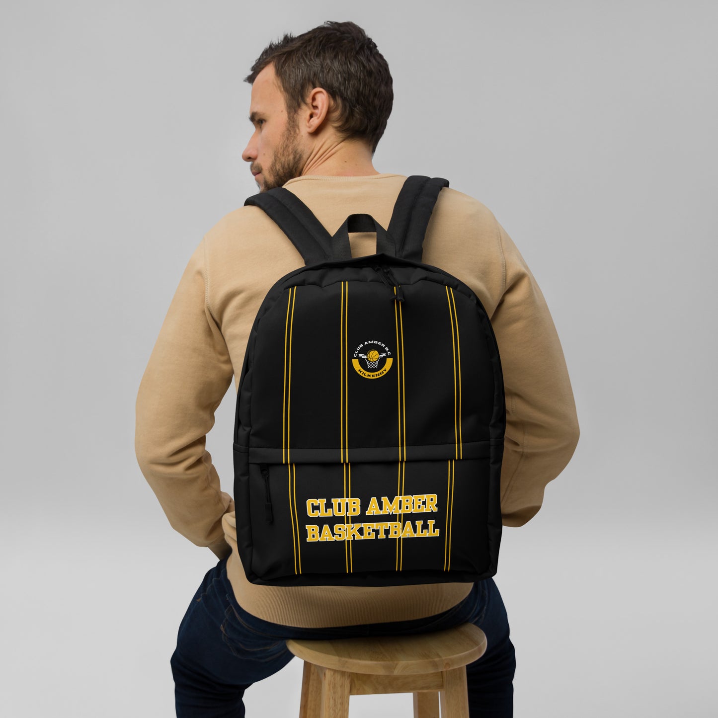 Medium Travel Backpack by Moon Behind The Hill for unisex in polyester & mesh amber & black features an stately silhouette from the Polyester & Mesh Medium Travel Backpack range, with a secure zipper, ample built-in-compartments, external-pockets, internal-pockets & laptop-compartment, and versatile backpack-strap.